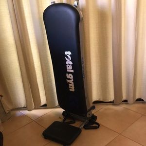 Total Gym APEX with up to 10 levels of resistance and attachments.